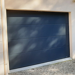Installation d'une double porte de garage Osilys